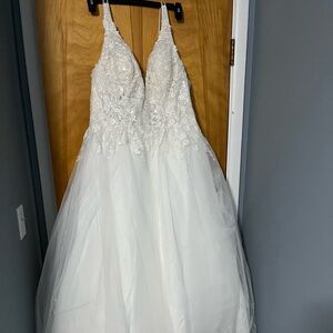 Women’s wedding dress, petticoat, and glitter veil
